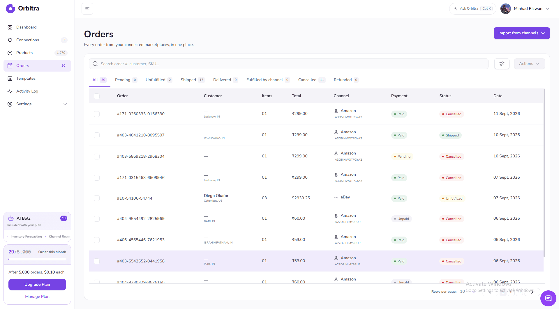The Orders page: status tabs above a table of orders with payment and fulfillment status.